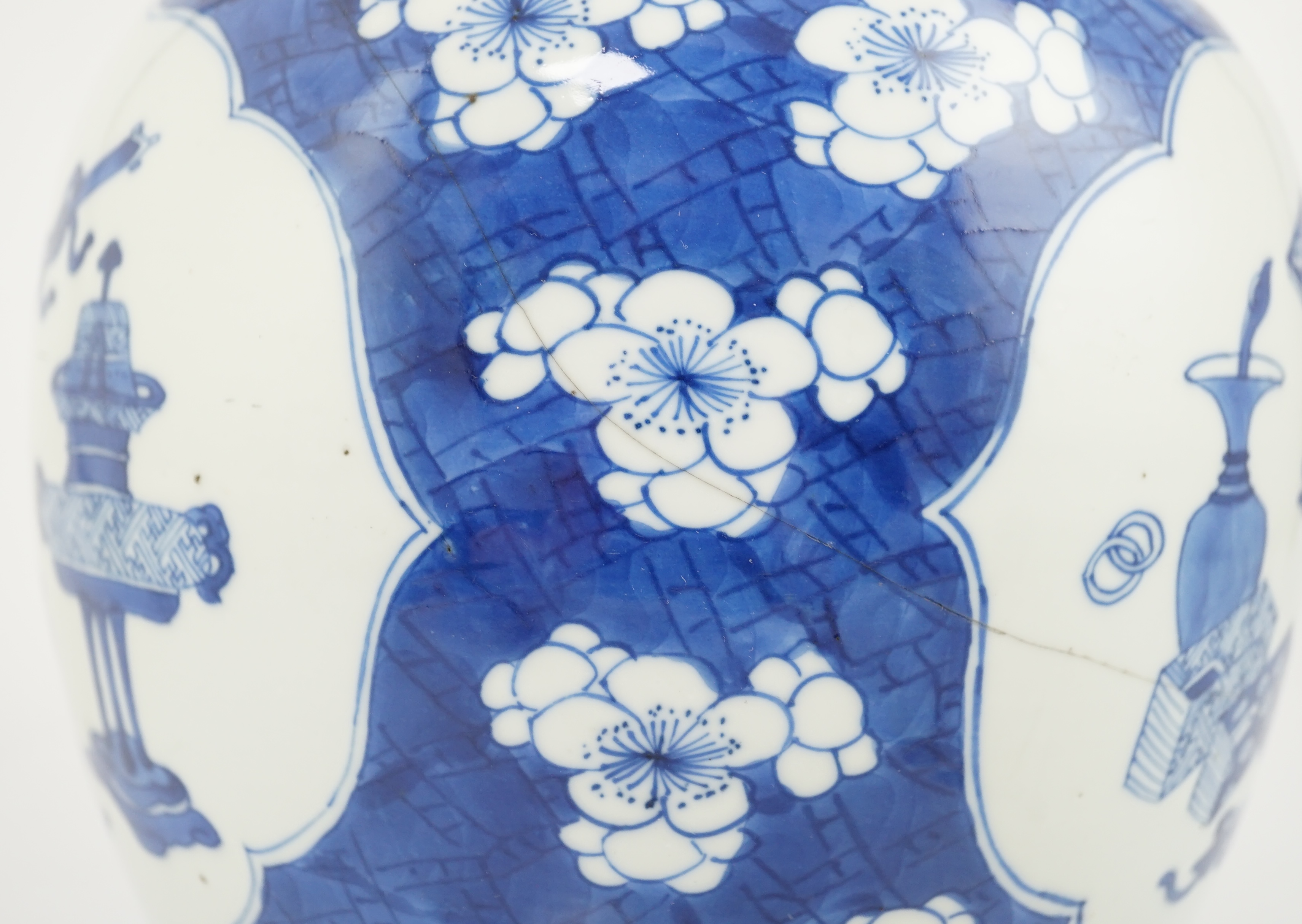 A Chinese blue and white ‘Antiques’ jar, Kangxi period, cracked